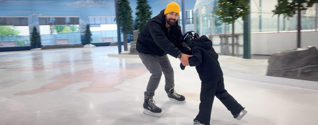 Father and son ice skating