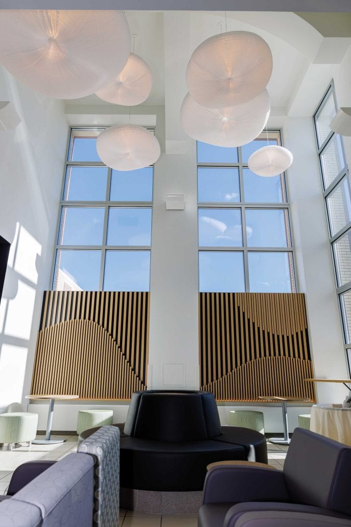 Large windows and seating in a cancer centre.