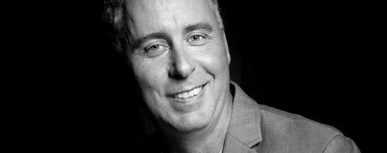 Black and white portrait of a man.
