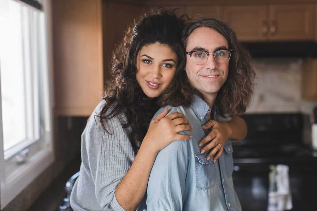 Man and woman in their kitchen. 