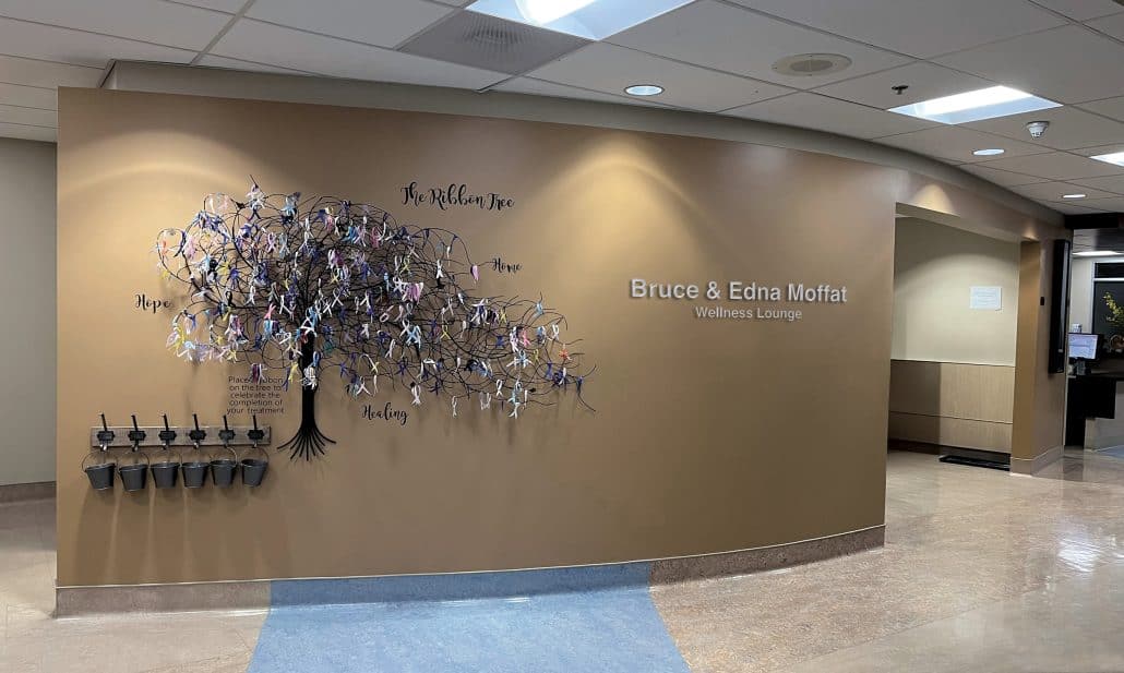 A tree made of ribbons on the wall of a hospital wellness lounge. 